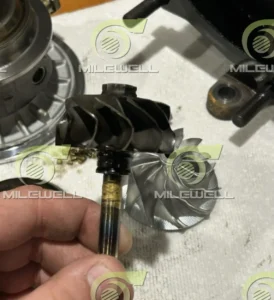Turbocharger oil starvation signs on turbine wheel and shaft
