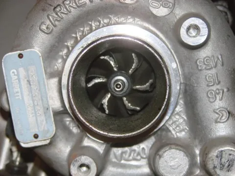 Compressor wheel with foreign object damage — nicked and bent blades