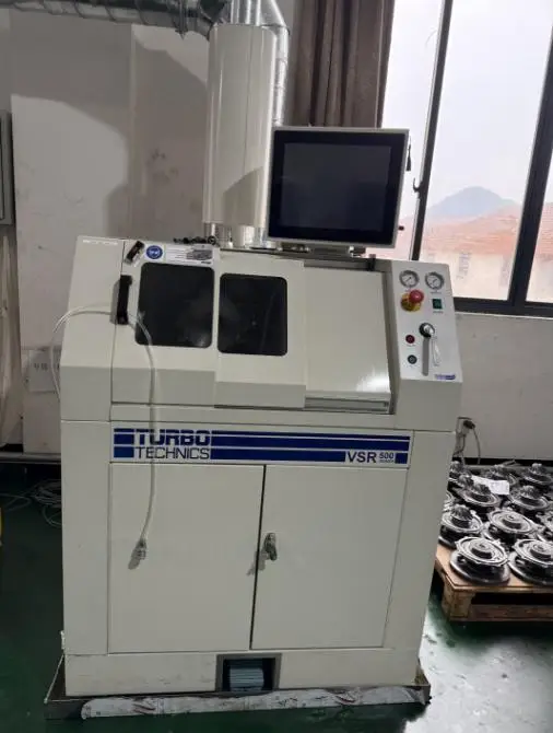 Turbo Technics VSR 500 balancing machine testing a turbocharger core